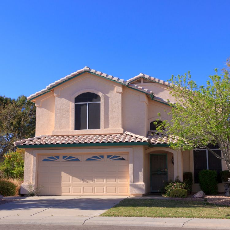 Two-story Arizona home with concrete tile roof and stucco exterior